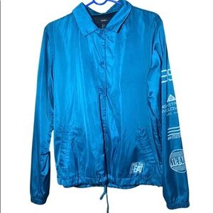 Blue “FEEL THE HEAT” Graphic Collared Wind Breaker. Unisex Large.